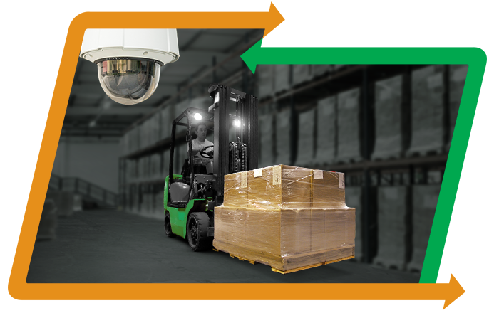 A surveillance camera and a lift truck in a warehouse